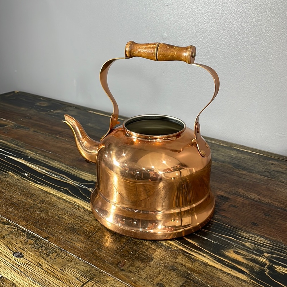 Solid copper teapot with wooden top handle.  Missing lid.